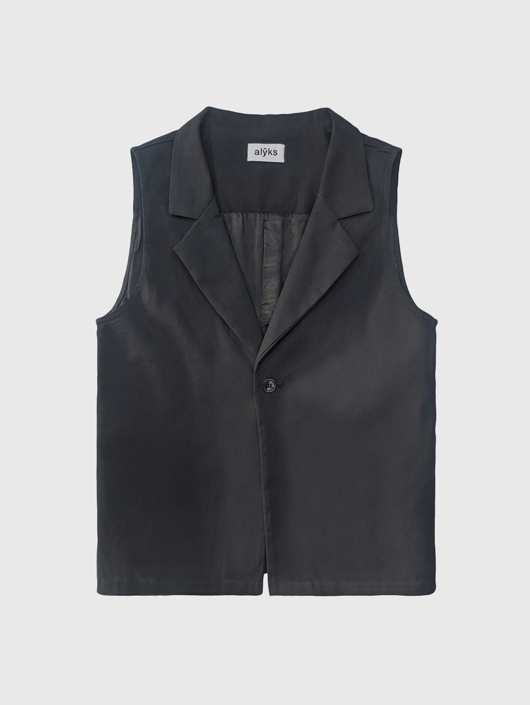 THE SLEEVELESS JACKET