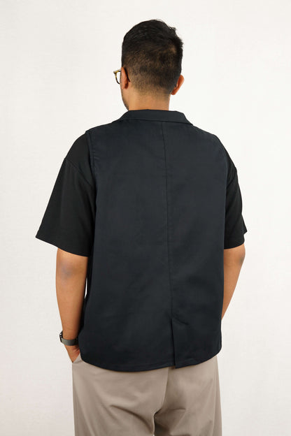 THE SLEEVELESS JACKET